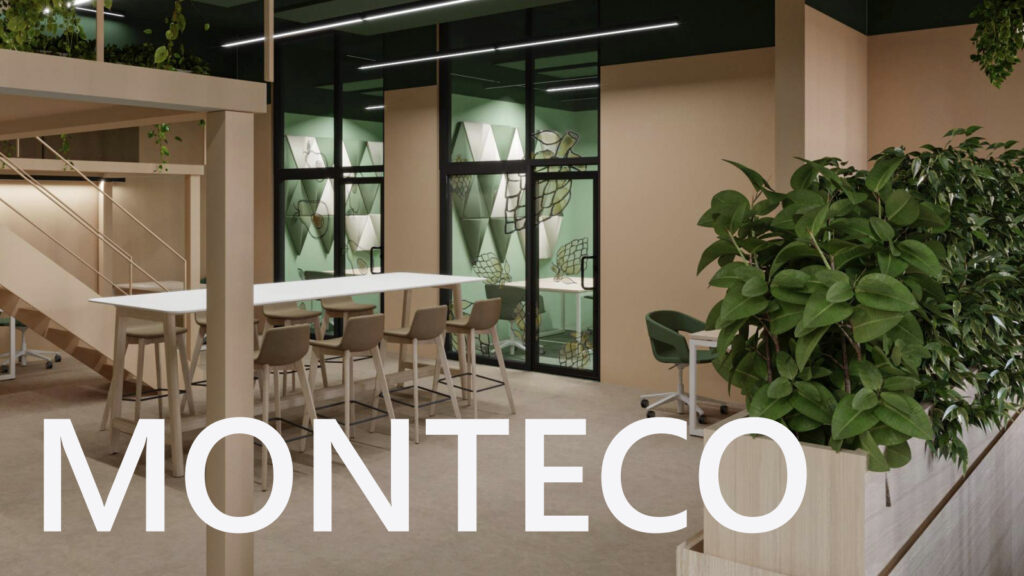The benefits of daily office space rental Interior view of Mont Eco coworking space with a focus on a high table and chairs next to a green partition with plants. The background shows a modern, glass-enclosed meeting room with green and white triangular acoustic panels. 'MONTECO' text is overlaid at the bottom of the image.