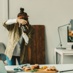 a woman taking a picture of food