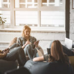 a group of people sitting in chairs