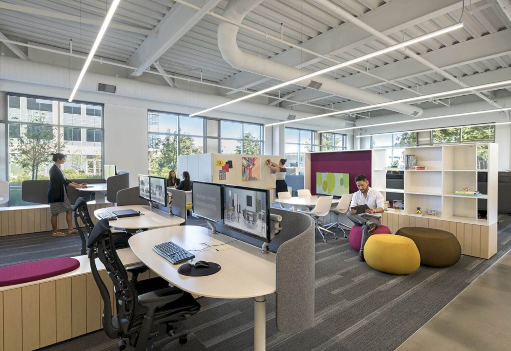 a group of people working in an office