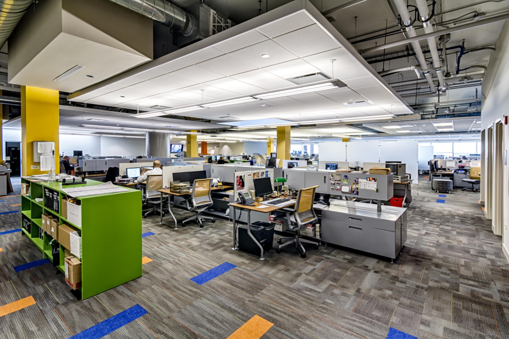 an office with cubicles and computers