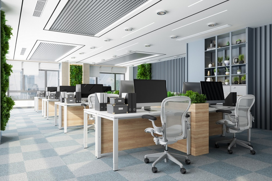 a room with computers and chairs