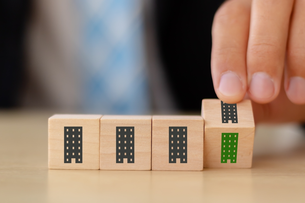 What is LEED certification, and how do you get it? Building blocks with one green block