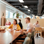 People collaborating in a modern workspace.