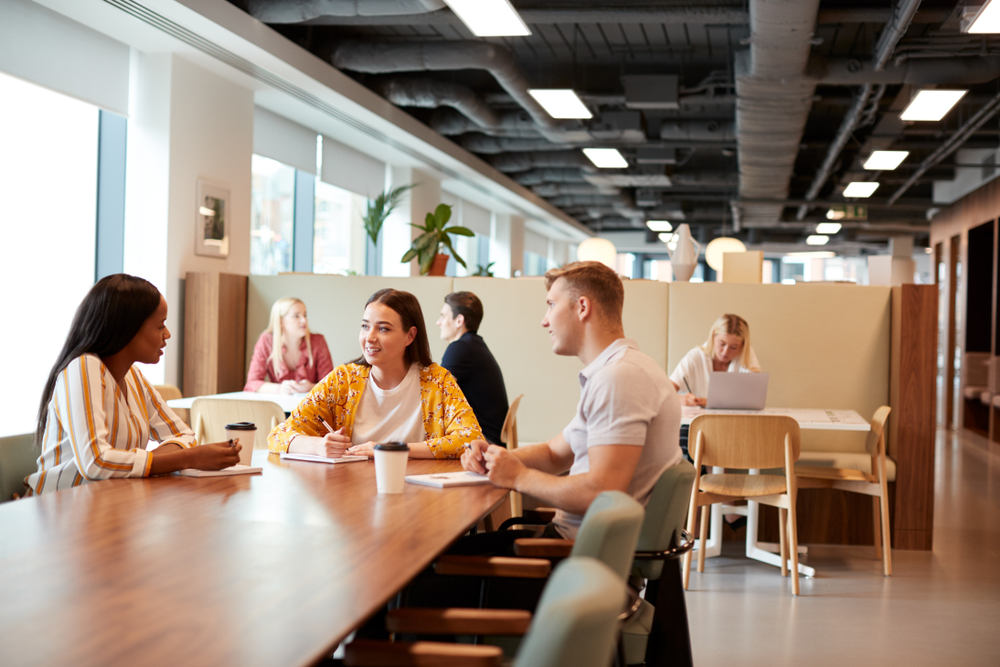 People collaborating in a modern workspace.
