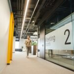 Modern office hallway with meeting room