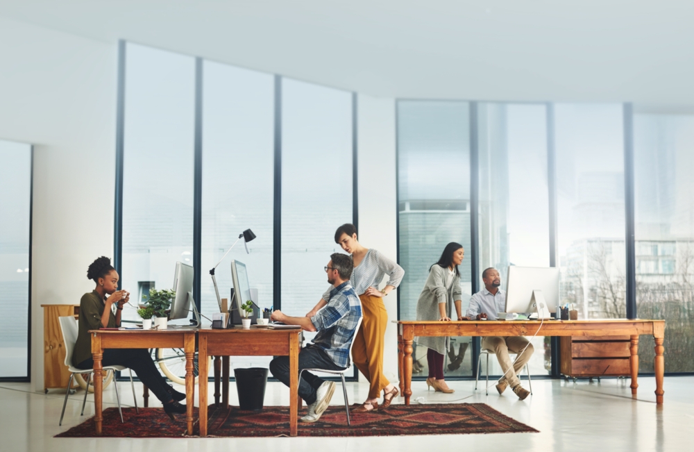 Modern office with collaborative workspace.