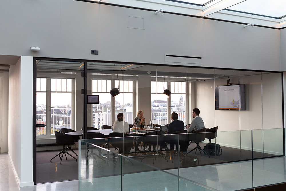 What is a collaboration hub? a group of people sitting at a table
