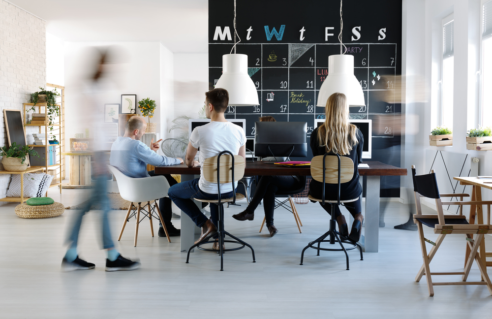 12 benefits of a collaborative workspace Modern office with collaborative workspace.