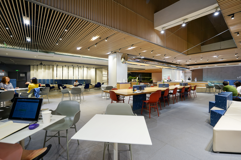 What is a collaboration hub? Modern cafe with empty tables