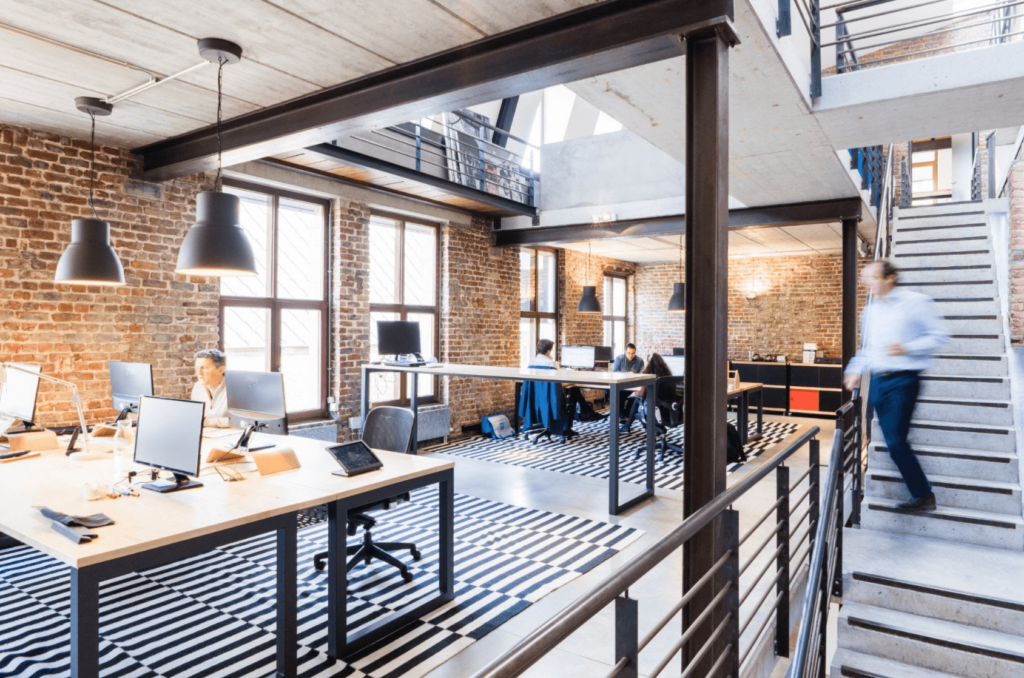 a room with a brick wall and a brick wall and a brick floor