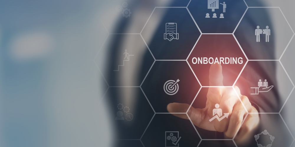 Businessman selecting onboarding process icon