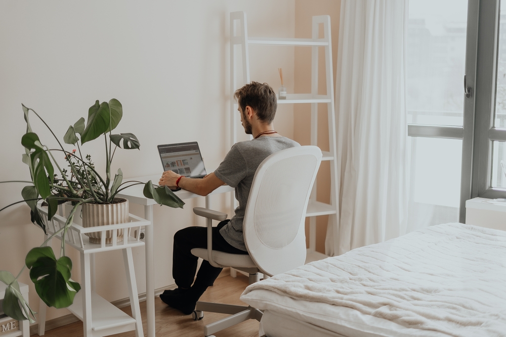 Five ways to set up your desk for productivity Man working at home office setup